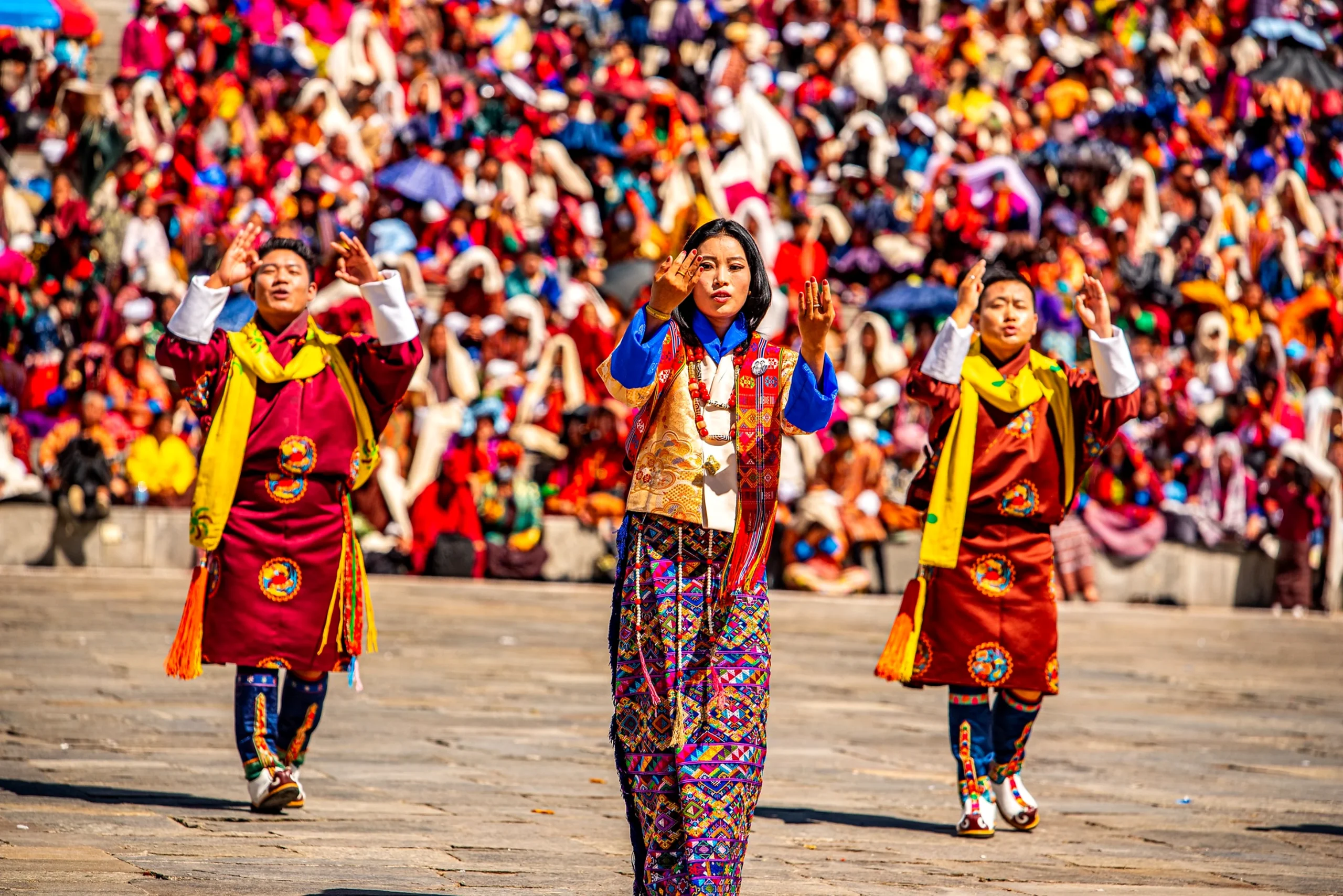 Dancers in festival costume at the Thimphu Tshechu